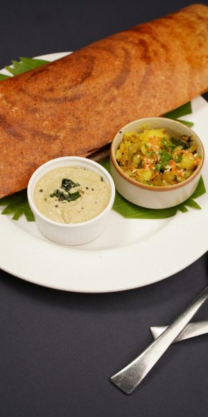 Food on Plate with Bowls of Sauces